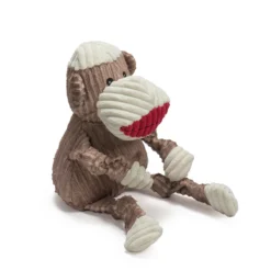 A side view of the HuggleHounds Stuey Sock Monkey Knottie® Plush Dog Toy.